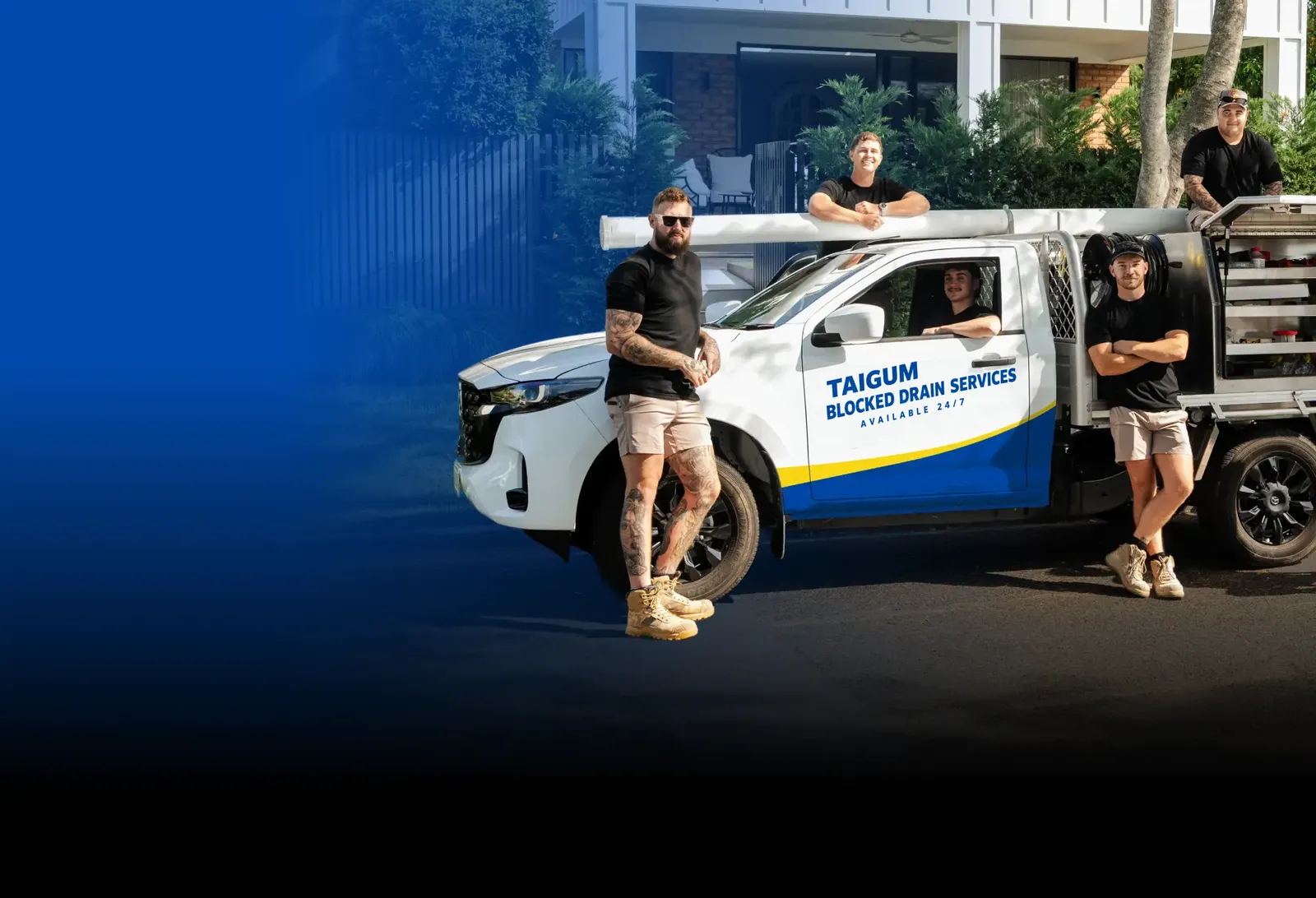 Taigum Blocked Drain Services team with the ute